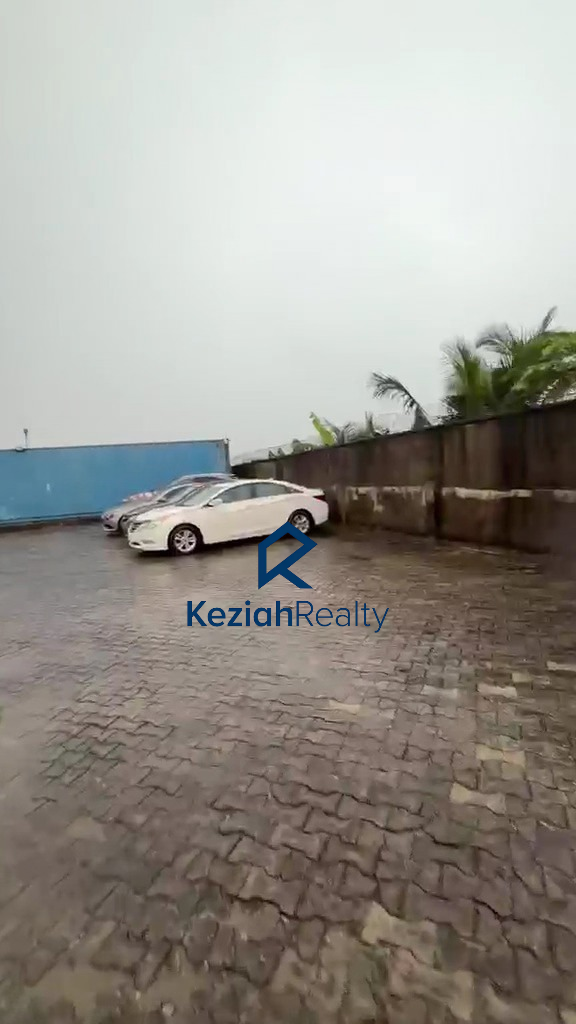 Front view of commercial land for sale facing Ogolonto Road in Ebute Ikorodu Lagos 