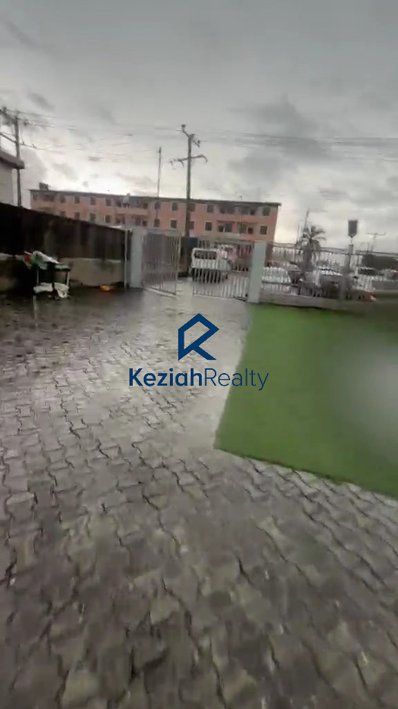 Front view of commercial land for sale facing Ogolonto Road in Ebute Ikorodu Lagos 